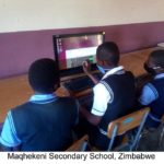 Children enjoying computer