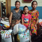 Family receiving food supplies